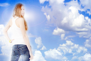 Image showing redheaded girl and solar sky