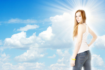 Image showing redheaded girl and solar sky