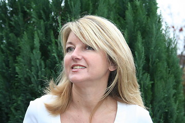 Image showing Blonde against green background