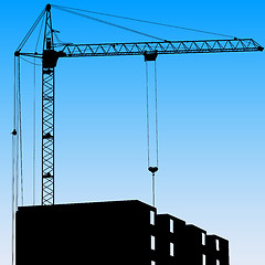 Image showing Silhouette of one cranes working on the building on a blue backg