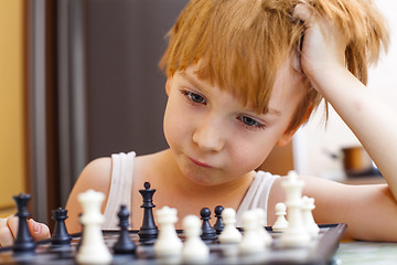 Image showing Boy playing chess