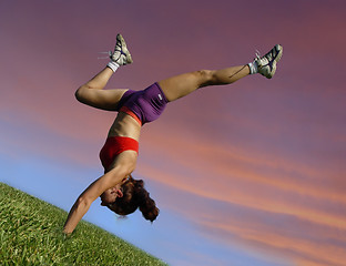 Image showing Girl exercising outdoors