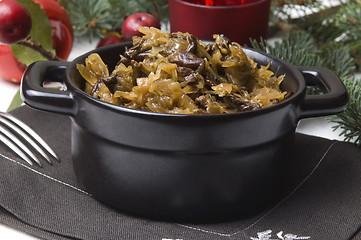 Image showing traditional polish sauerkraut (bigos) with mushrooms and plums