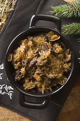 Image showing traditional polish sauerkraut (bigos) with mushrooms and plums