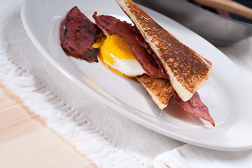 Image showing eggs bacon and toast bread