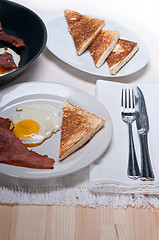 Image showing eggs bacon and toast bread