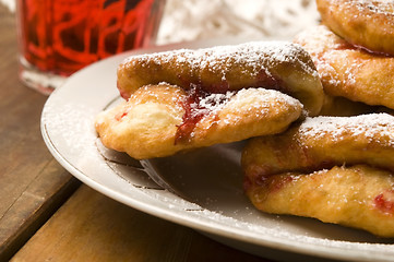 Image showing Dough with marmelade on wooden board