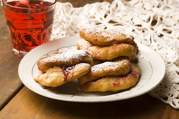 Image showing Dough with marmelade on wooden board