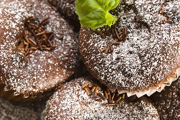 Image showing Homemade cinnamon muffins with coffe