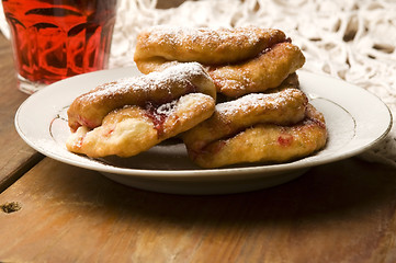 Image showing Dough with marmelade on wooden board