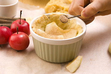 Image showing Detail of child hands making apple pie