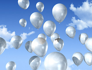 Image showing white balloons on a blue sky