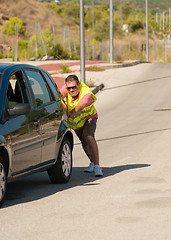 Image showing Pushing uphill