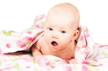 Image showing Little baby under multicolored towel