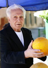 Image showing Old man at the marketplace