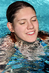 Image showing Happy girl in a pool