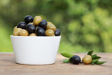 Image showing Green and black olives