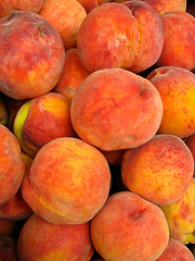 Image showing Many bright tasty peaches