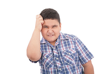 Image showing Adorable boy upset isolated over white background 