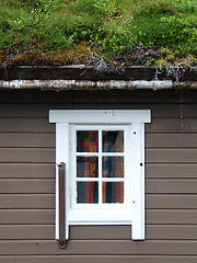 Image showing Norwegian house with grass on the roof