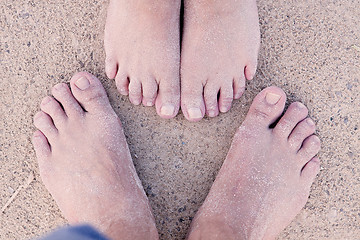 Image showing barefoot in the sand in summer holidays relaxing