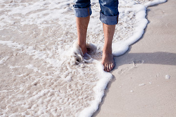 Image showing barefoot in the sand in summer holidays relaxing