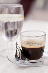 Image showing hot aromatic espresso cup and cold water in glass