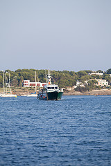 Image showing fishing boat in summer outside in sea at harbour