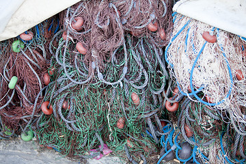 Image showing fishnet trawl rope putdoor in summer at harbour