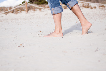 Image showing barefoot in the sand in summer holidays relaxing