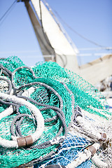 Image showing fishnet trawl rope putdoor in summer at harbour