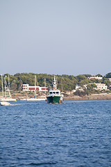 Image showing fishing boat in summer outside in sea at harbour