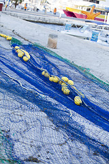 Image showing fishnet trawl rope putdoor in summer at harbour