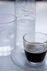 Image showing hot aromatic espresso cup and cold water in glass