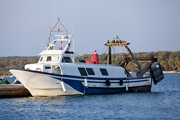 Image showing fishing boat in summer outside in sea at harbour