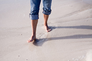 Image showing barefoot in the sand in summer holidays relaxing