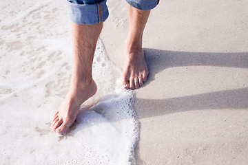 Image showing barefoot in the sand in summer holidays relaxing