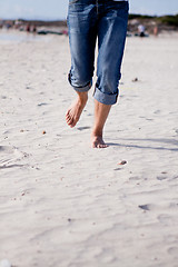 Image showing barefoot in the sand in summer holidays relaxing