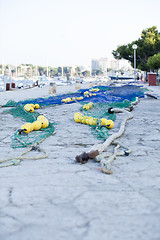 Image showing fishnet trawl rope putdoor in summer at harbour