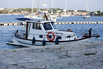 Image showing fishing boat in summer outside in sea at harbour