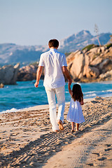 Image showing happy family father and daughter on beach having fun