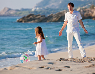 Image showing happy family father and daughter on beach having fun