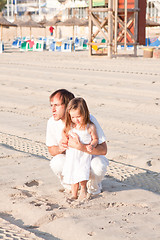 Image showing happy family father and daughter on beach having fun