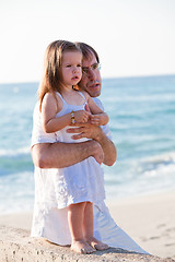 Image showing happy family father and daughter on beach having fun