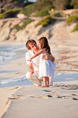 Image showing happy family father and daughter on beach having fun