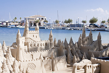 Image showing creative big sandcastle on the beauch in summer