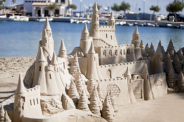 Image showing creative big sandcastle on the beauch in summer