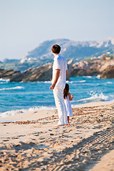 Image showing happy family father and daughter on beach having fun