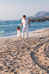 Image showing happy family father and daughter on beach having fun