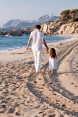 Image showing happy family father and daughter on beach having fun